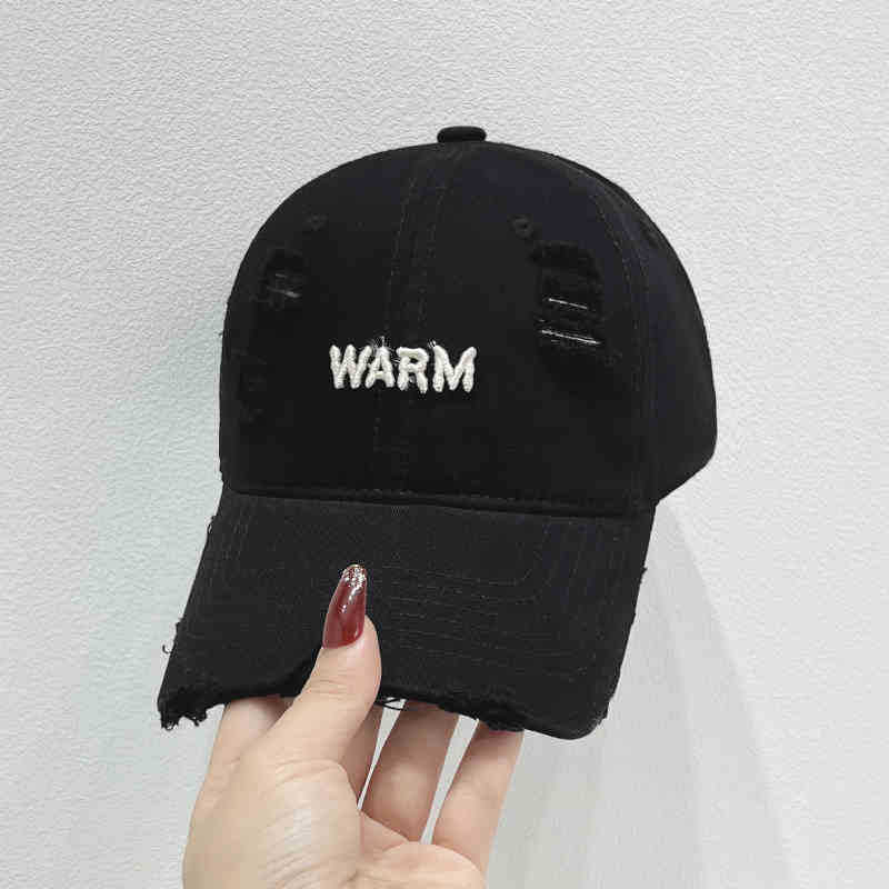 Damen Baumwoll-Cap im Used-Look mit gestickter Botschaft Skanto