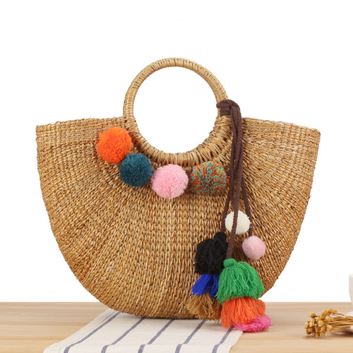 Strohtasche mit bunten Quasten und Pompons Skanto
