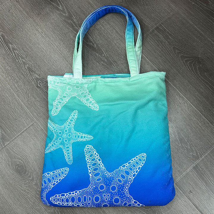 Strandtuch mit elegantem Blumenmuster Skanto