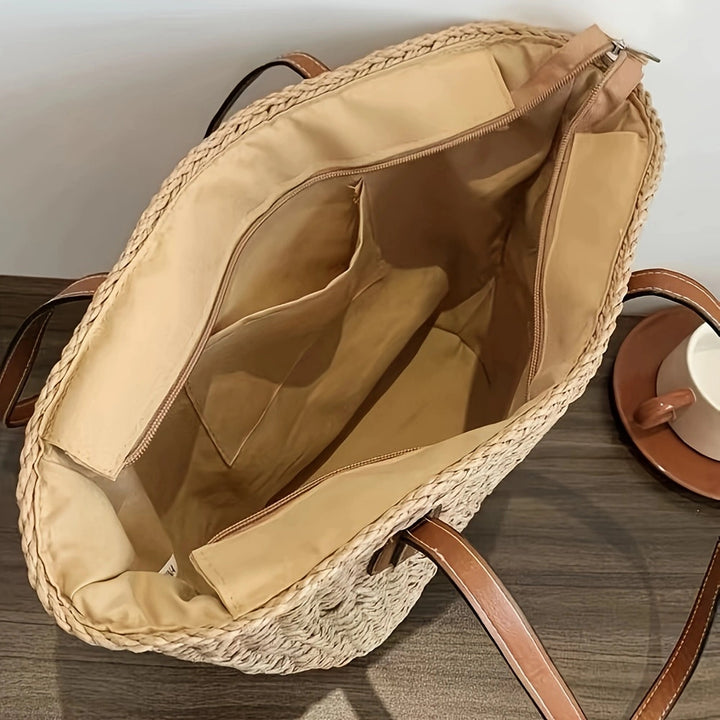 Handtasche aus geflochtenem Naturmaterial mit eleganten Ledergriffen Skanto
