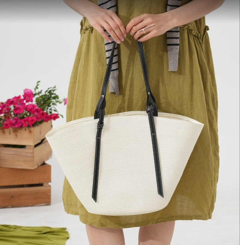 Elegante Strandtasche aus gewebtem Naturmaterial mit Lederdetails Skanto