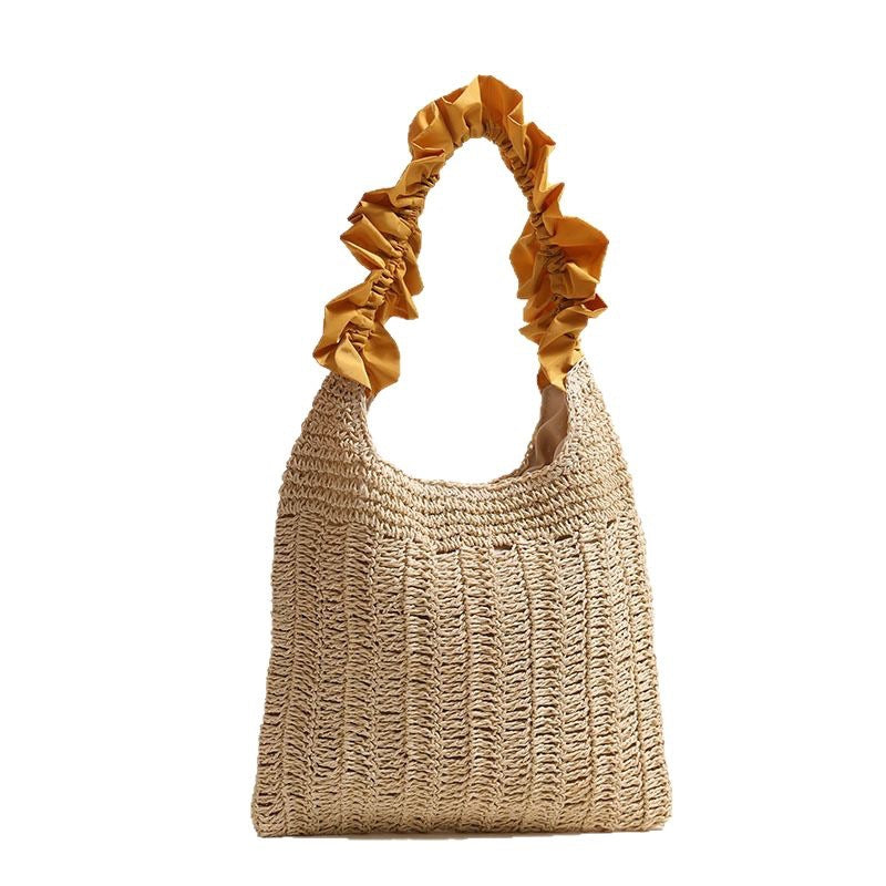 Elegante Handtasche mit gerafftem Ziergriff Skanto