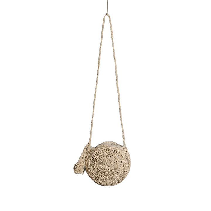 Runde Tasche aus natürlicher Jute mit trendigem Fransen-Detail Skanto