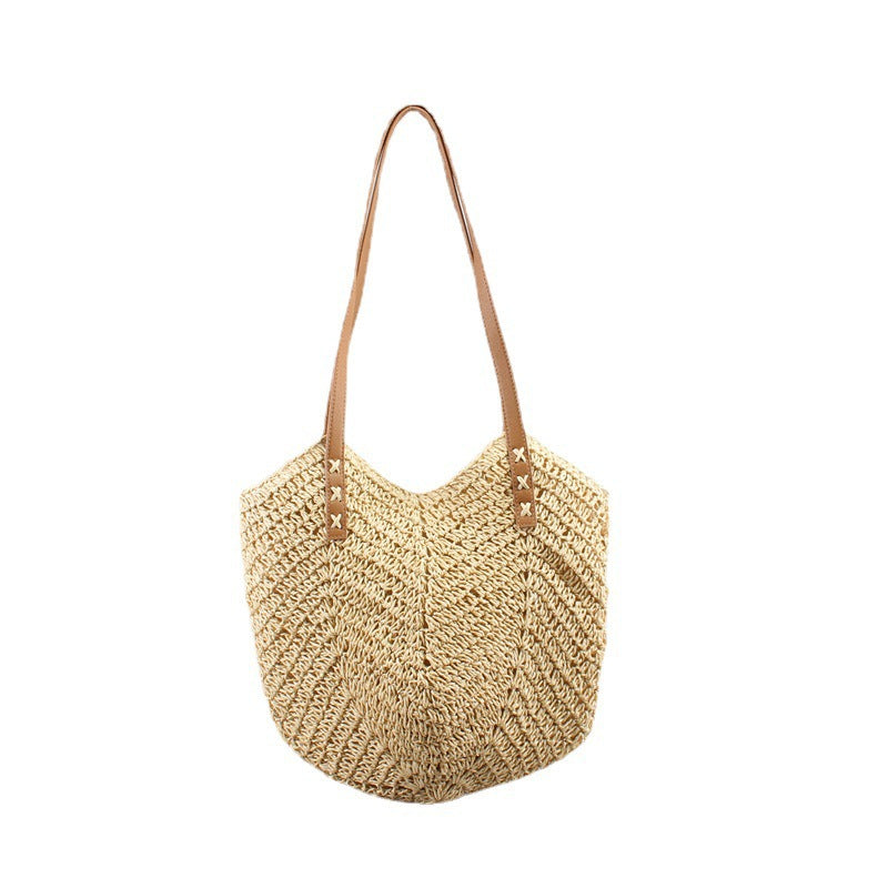 Freizeittaschen aus handgewebtem Raffia mit breiten Ledergriffen Skanto