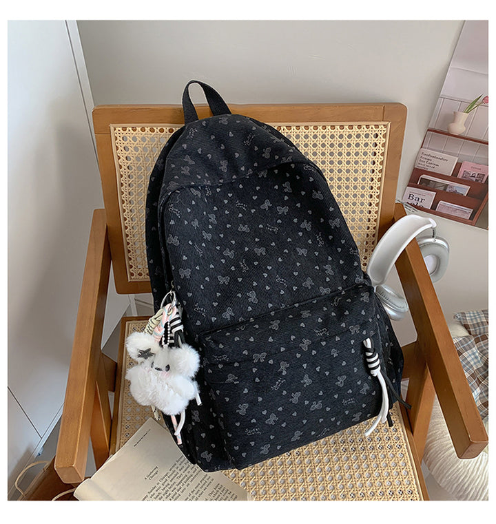 Niedlicher Schulrucksack mit dekorativem Muster