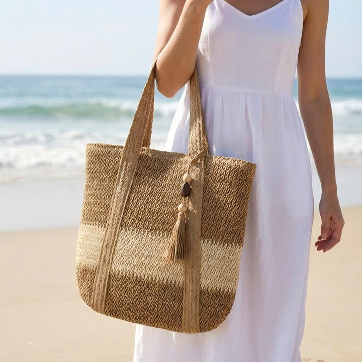 Handtasche aus natürlichem, handgewebtem Stroh mit eleganten Fransen Skanto
