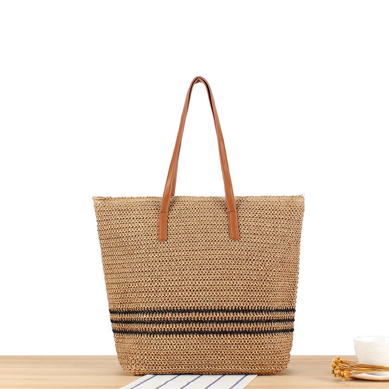 Stylische Strandtasche aus Naturgeflecht mit Ledergriffen Skanto