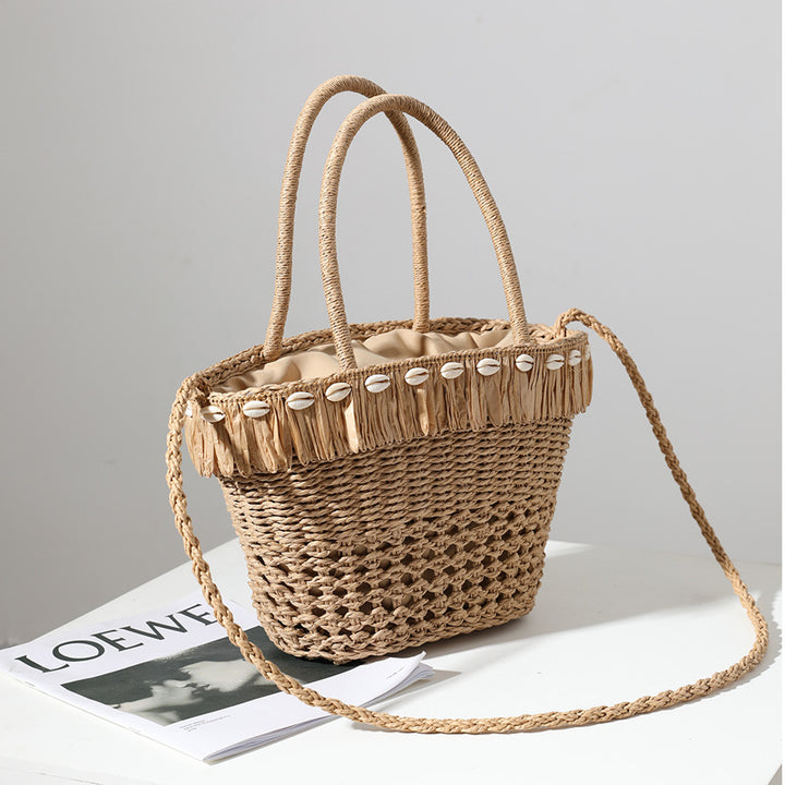 Geflochtene Strohtasche mit dekorativer Quaste Skanto