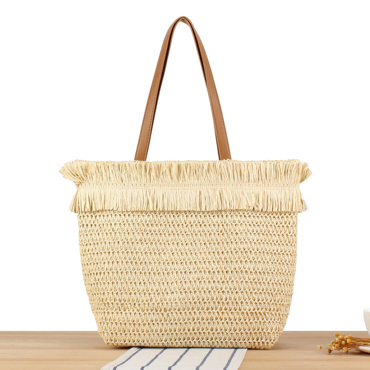 Strandtasche aus handgewebtem Naturmaterial mit Fransen-Detail Skanto