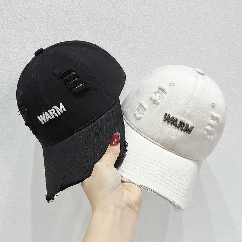 Damen Baumwoll-Cap im Used-Look mit gestickter Botschaft Skanto