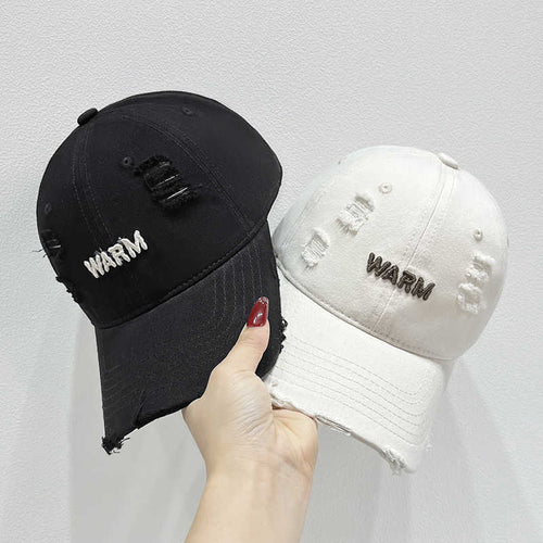 Damen Baumwoll-Cap im Used-Look mit gestickter Botschaft Skanto