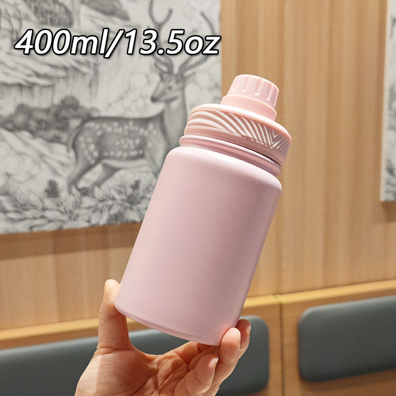 Skanto Isolierte Trinkflasche für Frauen mit ergonomischem Griff Skanto