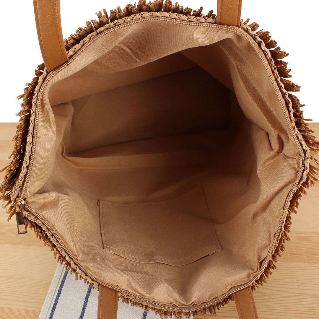 Strandtasche aus handgewebtem Naturmaterial mit Fransen-Detail Skanto