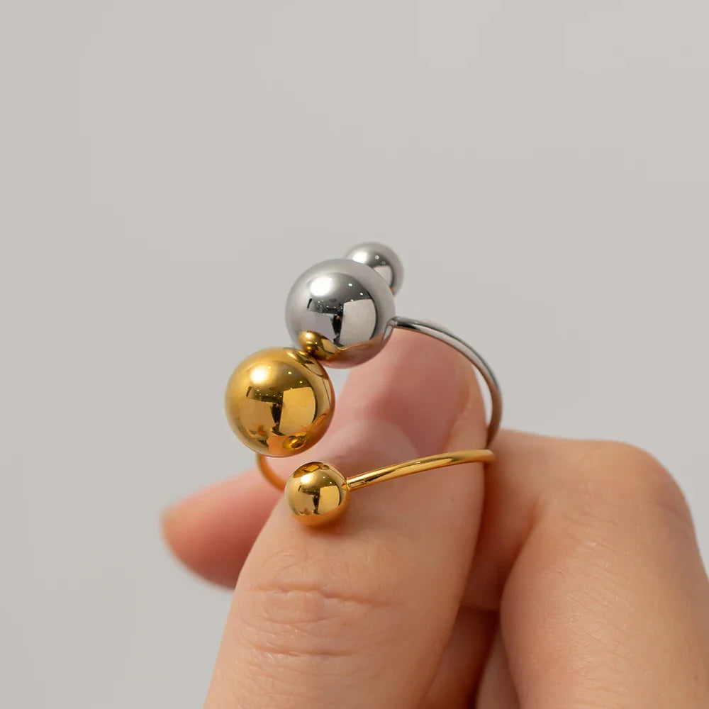 Skanto | 18k Markanter offener Ring mit zwei Kugeln