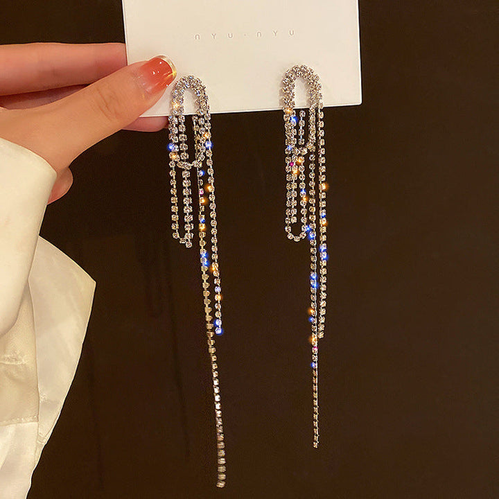 Skanto | Diamantbesetzte Metall-Ohrringe mit langen Quasten für Damen