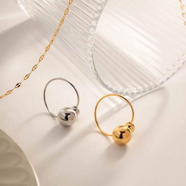 Skanto | 18k Markanter offener Ring mit zwei Kugeln