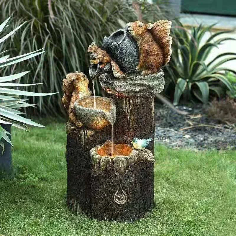 Skanto | Lunaverde Solar Deko Ente & Eichhörnchen | Gartenfigur mit LED-Licht | Wetterfestes Harz | Für Terrasse & Balkon