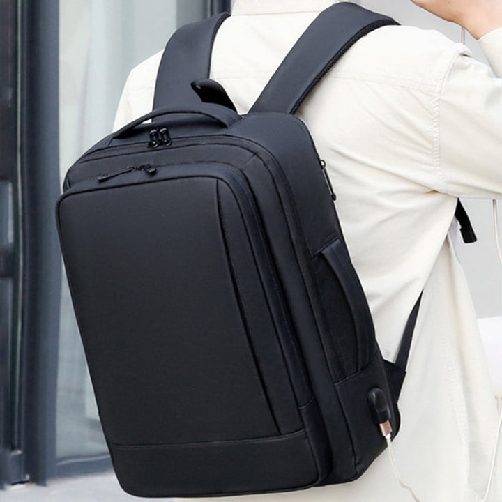 Skanto | Erweiterbarer wasserdichter Laptop-Rucksack für die Arbeit mit USB-Anschluss (Schwarz)