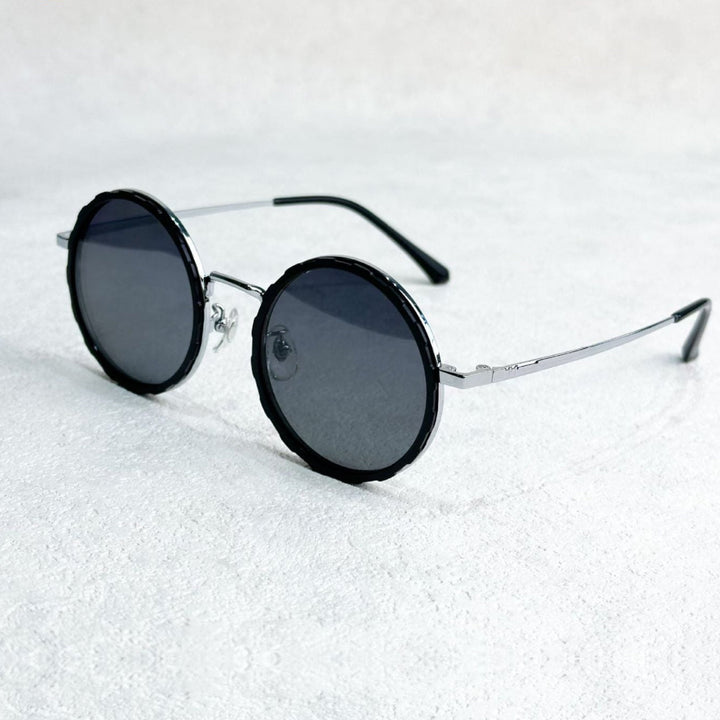 Skanto | Unisex Runde Polarisierte Sonnenbrille – Einstellbare Lichtreduzierung – Premium Metallrahmen
