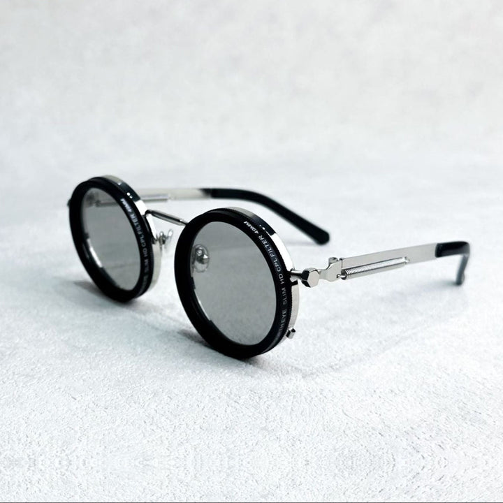 Skanto | Unisex Runde Polarisierte Sonnenbrille – Einstellbare Lichtreduzierung – Premium Metallrahmen