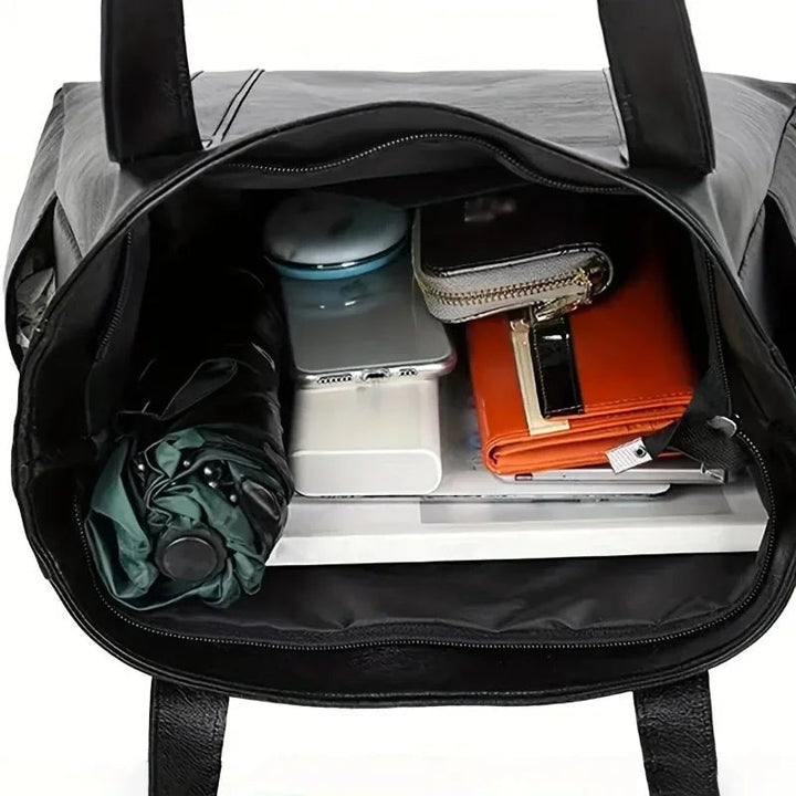 Skanto | Elegante Leder-Schultertasche mit Retro-Touch und glatter Oberfläche