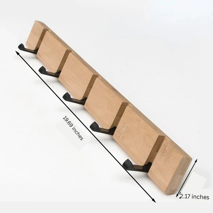 Skanto | Wandgarderobe aus Holz mit versteckten Haken