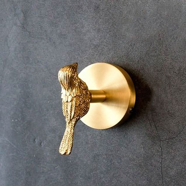 Skanto | Wandhakenleiste aus Messing mit Tiermotiven, goldene Akzente
