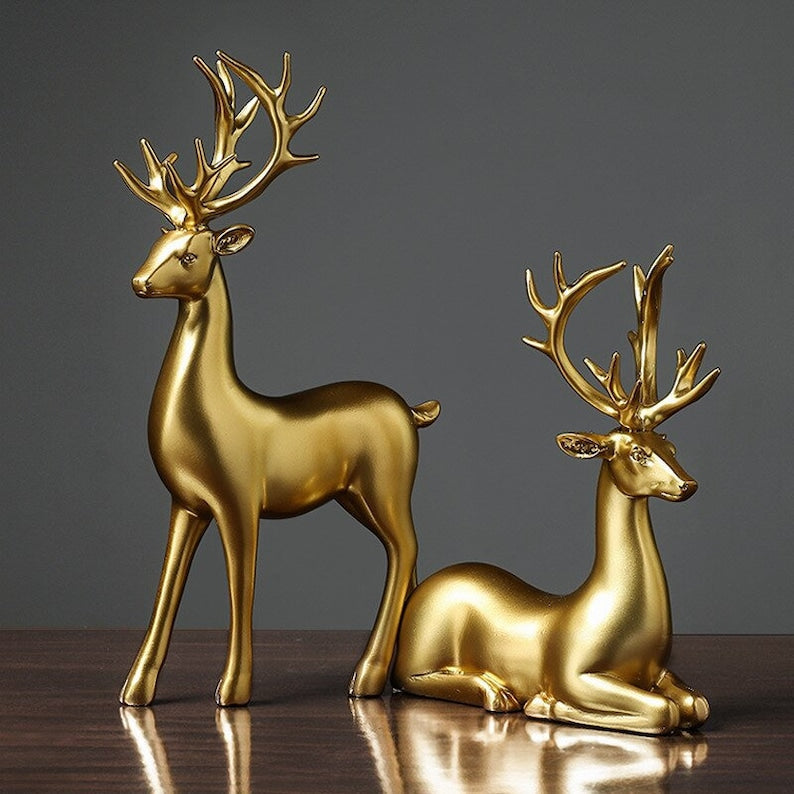 Skanto | Goldene Hirschfiguren
