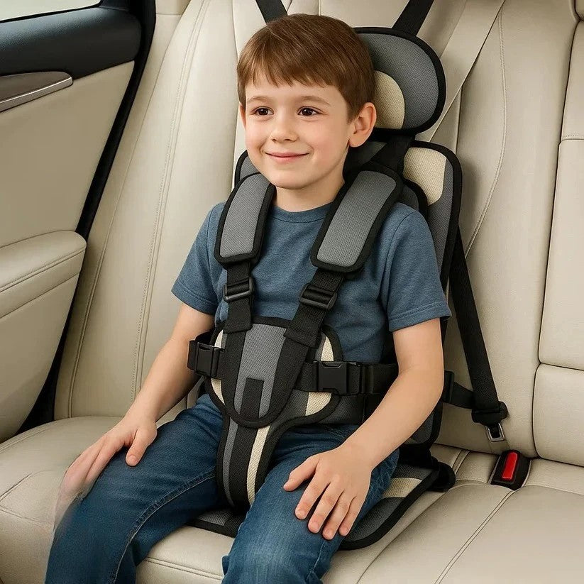 Skanto | Kompakter Reiseautositz für Kinder