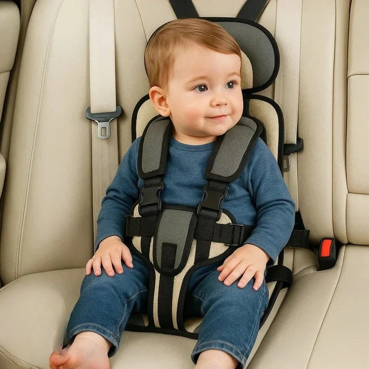 Skanto | Kompakter Reiseautositz für Kinder