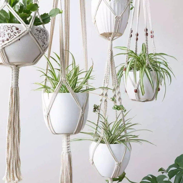 Skanto | 4-teiliges handgefertigtes Boho Makramee Pflanzenhänger-Set