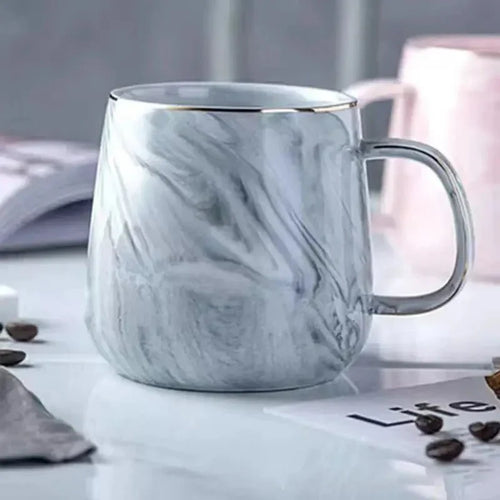 Skanto | Pastellfarbene Keramik-Kaffeetasse mit Marmormuster