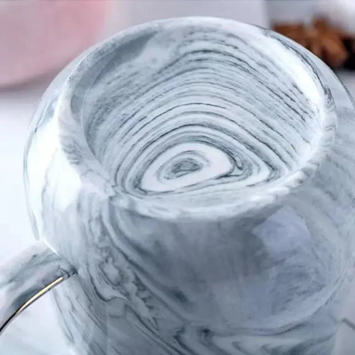 Skanto | Pastellfarbene Keramik-Kaffeetasse mit Marmormuster