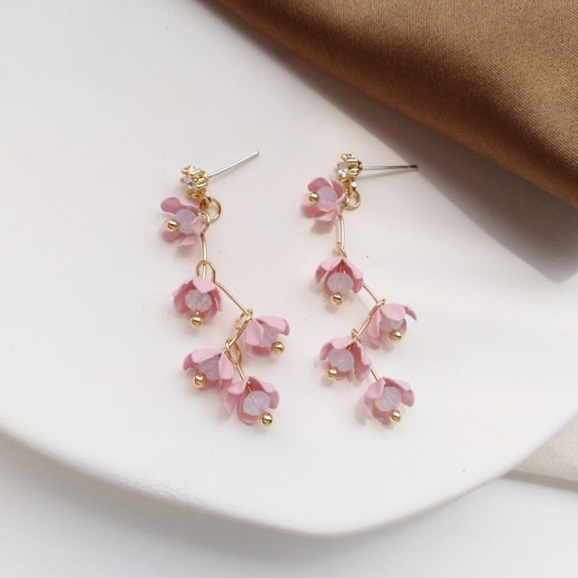 Skanto | Lange Strass-Kristall-Pink-Sakura-Blume mit Zirkon-Clip-Ohrringen