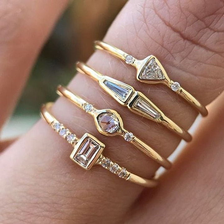 Skanto | Geometrisches Goldfarbenes Kombinations-Ring-Set mit runden Zirkonkristallen