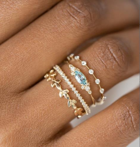 Skanto | Geometrisches Goldfarbenes Kombinations-Ring-Set mit runden Zirkonkristallen